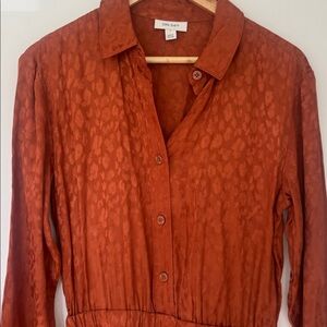 On 34th cheetah leopard orange jumpsuit